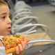 Illustration for article titled Pilot tries to compensate for diverted flight by ordering passengers Papa John’s